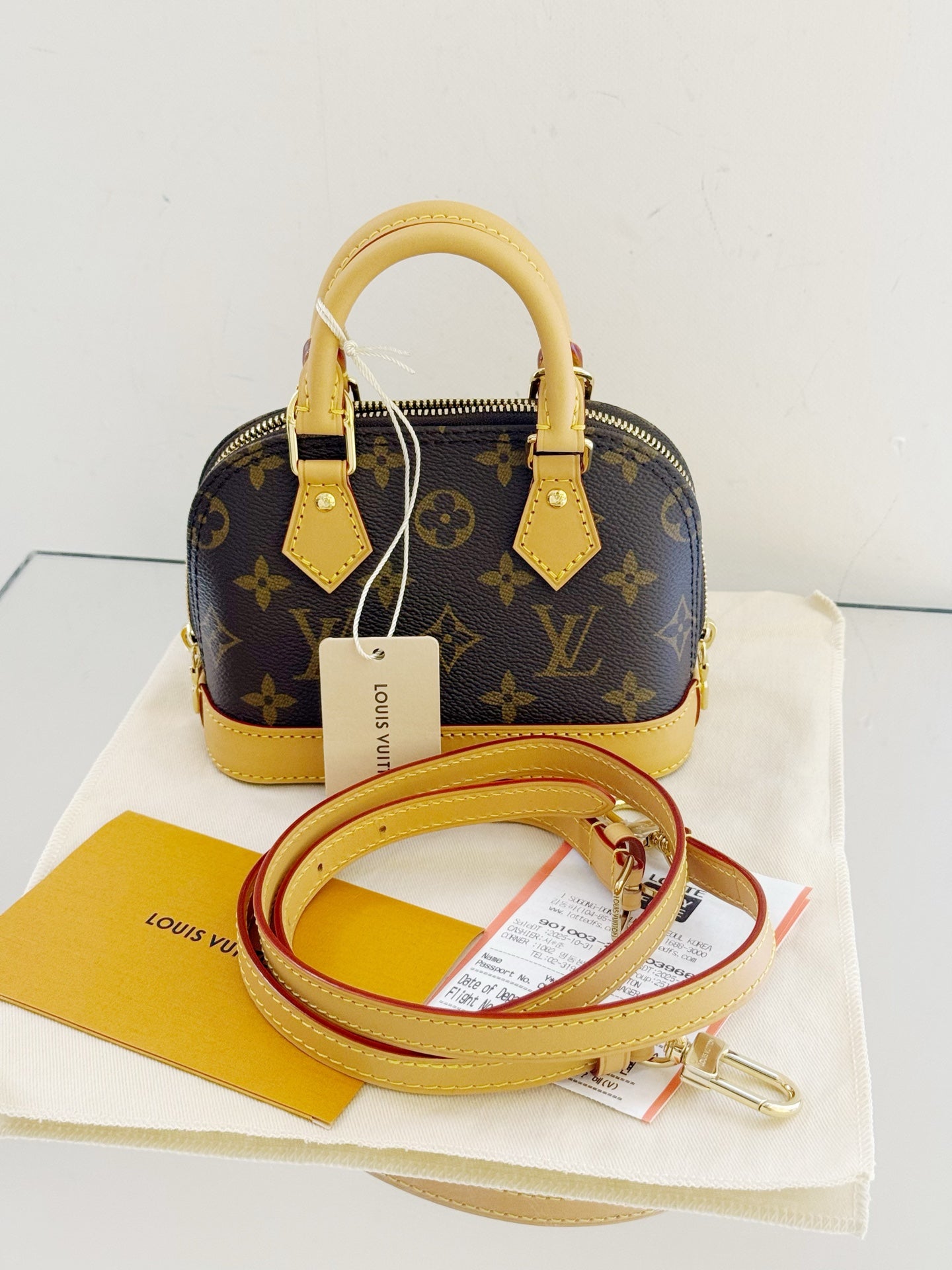 Louis Vuitton - Alma Nano - Monogram coated canvas with Vachetta leather trim - Brown - (mini)