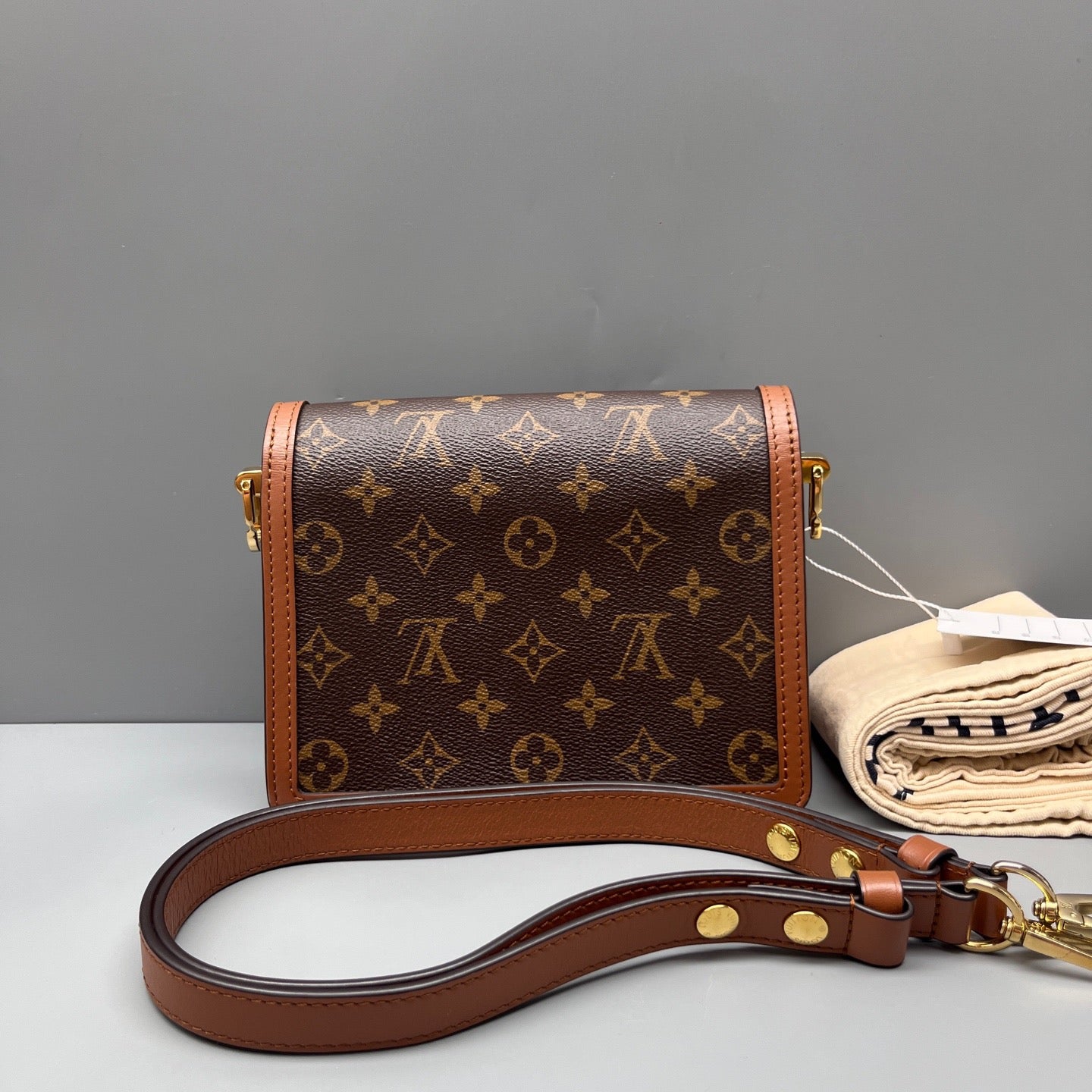Louis Vuitton - Dauphine Pochette - Monogram coated canvas with leather trim - Brown - (small)