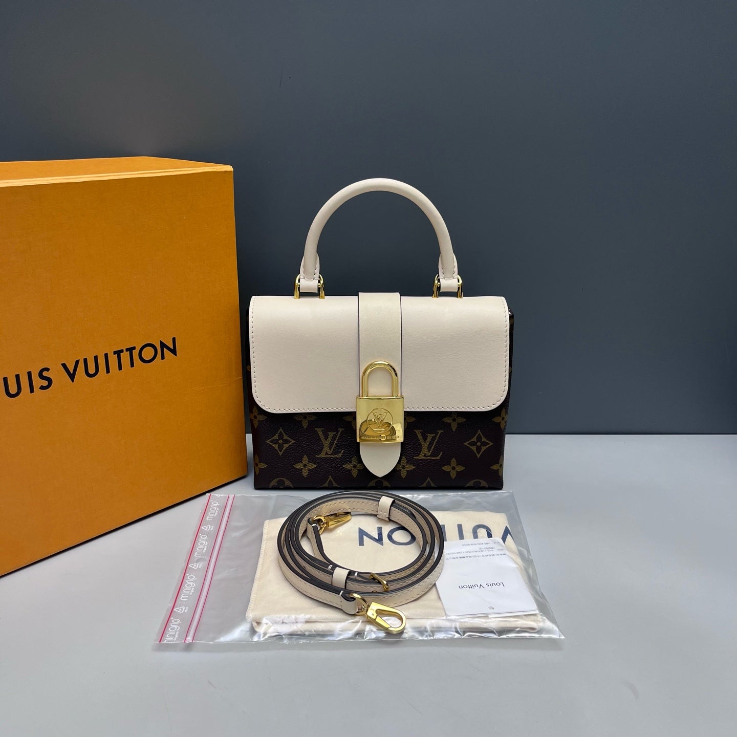 Louis Vuitton - Locky BB - Monogram coated canvas and smooth leather - Brown and Creamy White - (mini)