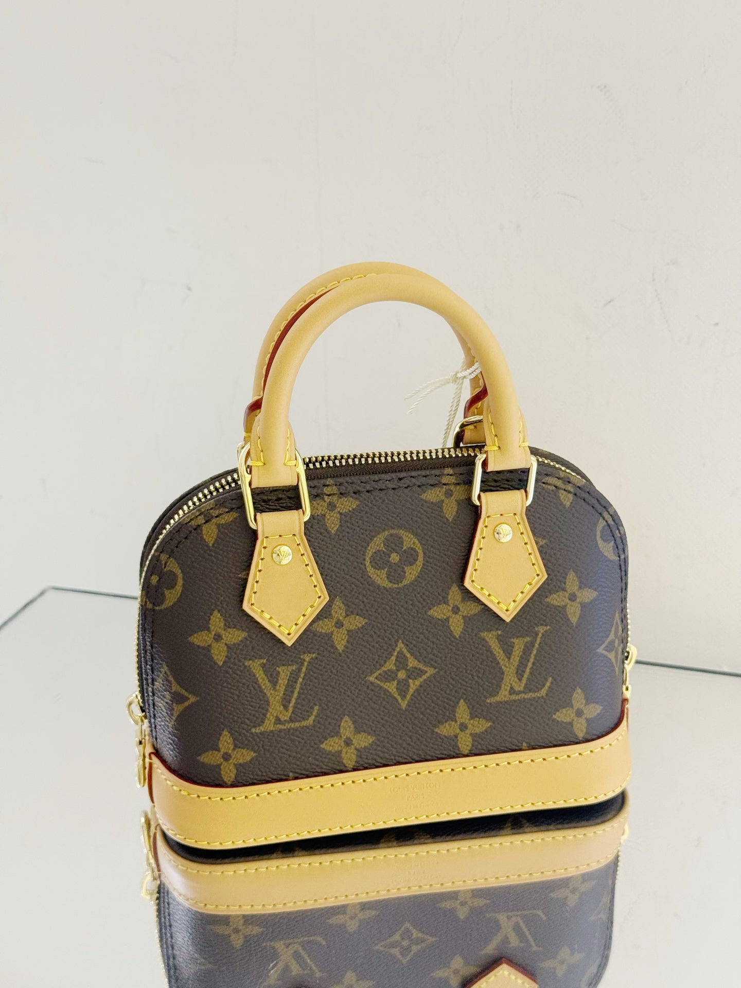 Louis Vuitton - Alma Nano - Monogram coated canvas with Vachetta leather trim - Brown - (mini)