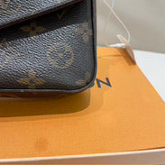 Louis Vuitton - Pochette Félicie - Monogram coated canvas with grained leather trim and interior - Brown - (mini)