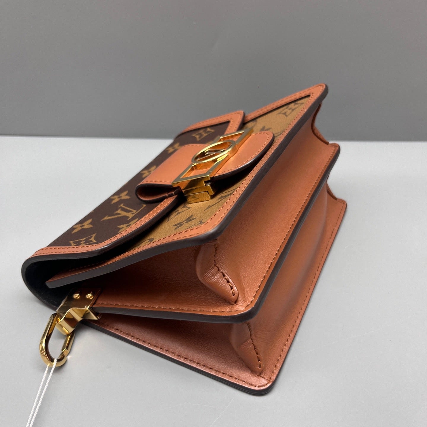 Louis Vuitton - Dauphine Pochette - Monogram coated canvas with leather trim - Brown - (small)
