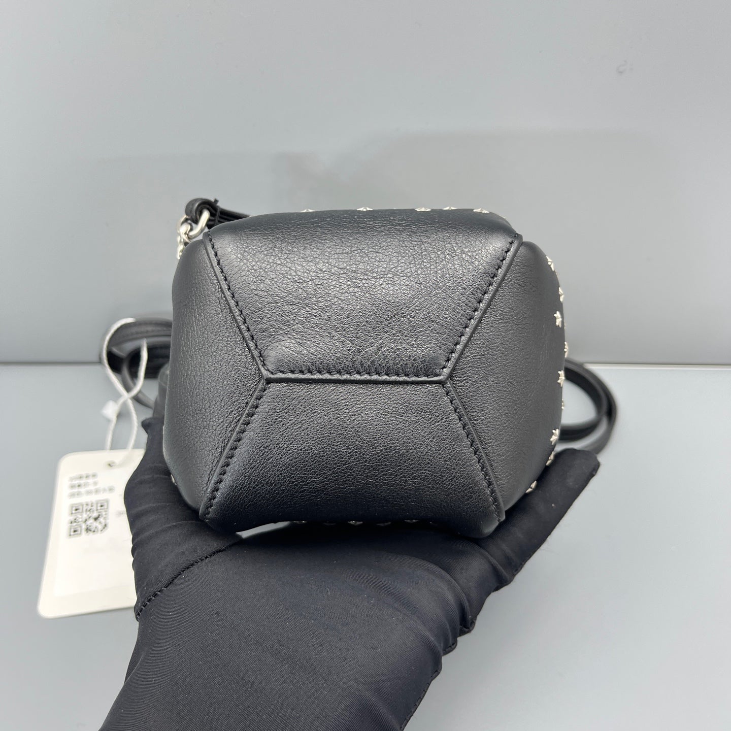 Saint Laurent - Studded Drawstring Bucket Bag - Grained leather - Black - (mini)