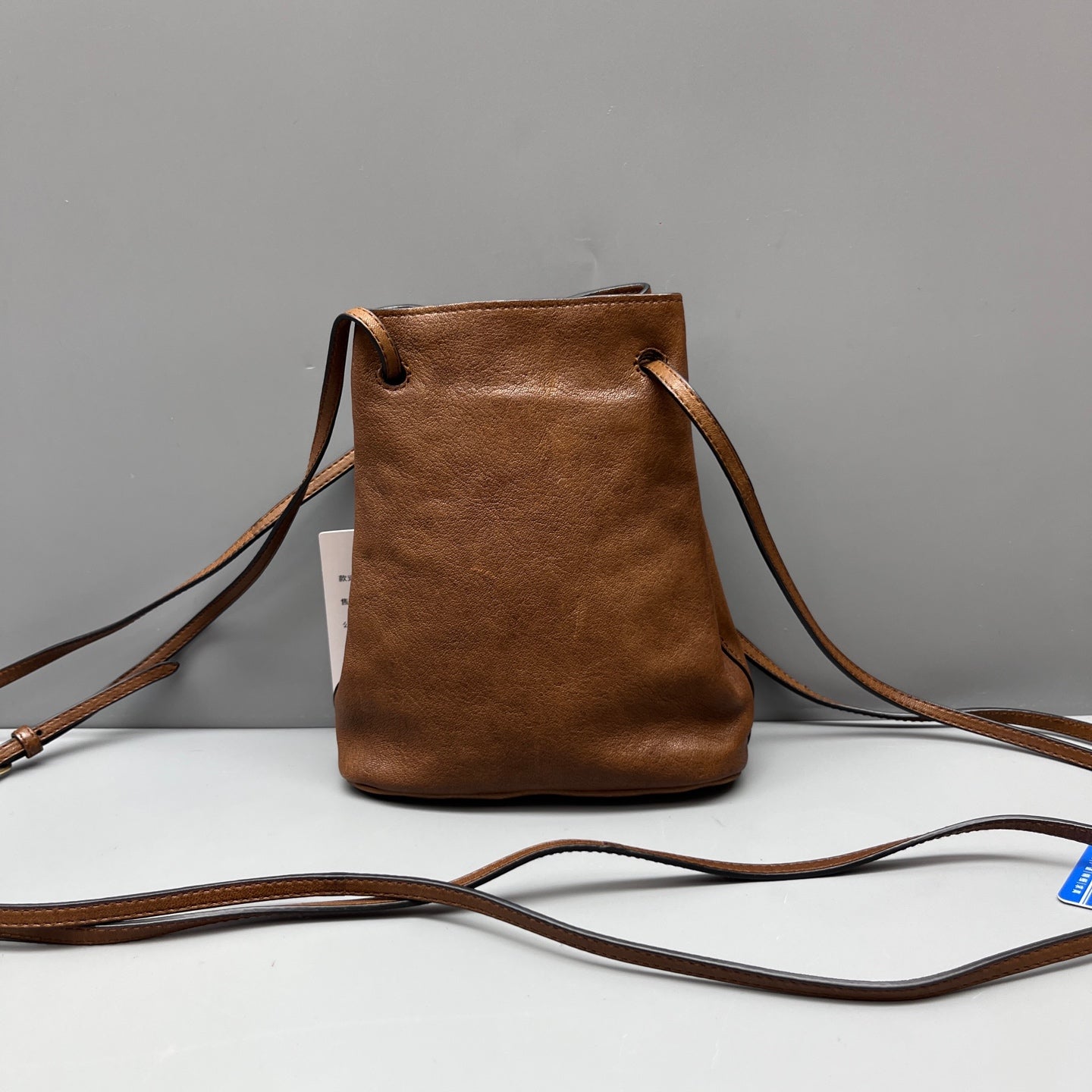 Miu Miu - Drawstring Mini Bucket Bag - Grained leather - Brown - (mini)