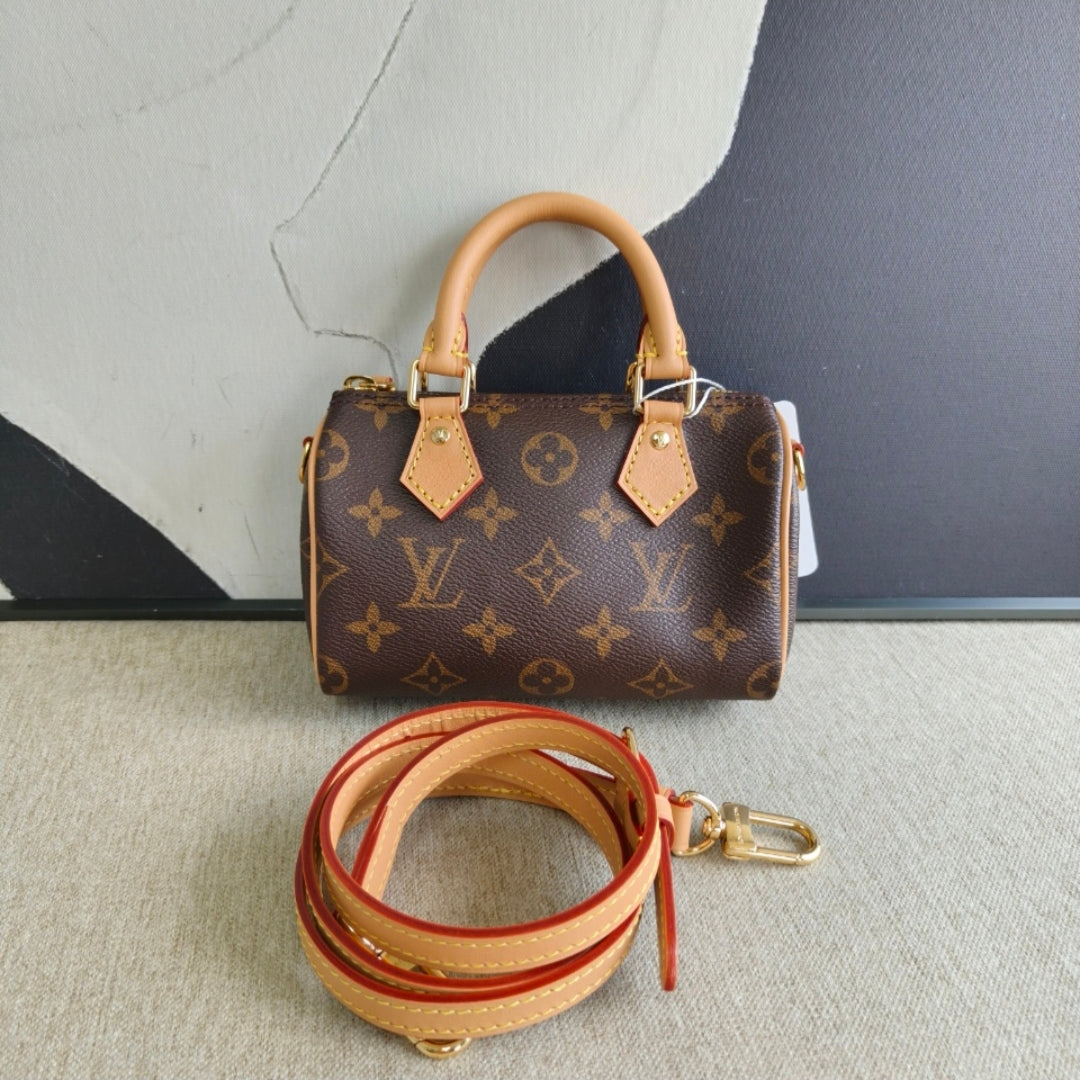 Louis Vuitton - Speedy Nano - Monogram coated canvas with Vachetta leather trim - Brown - (mini)