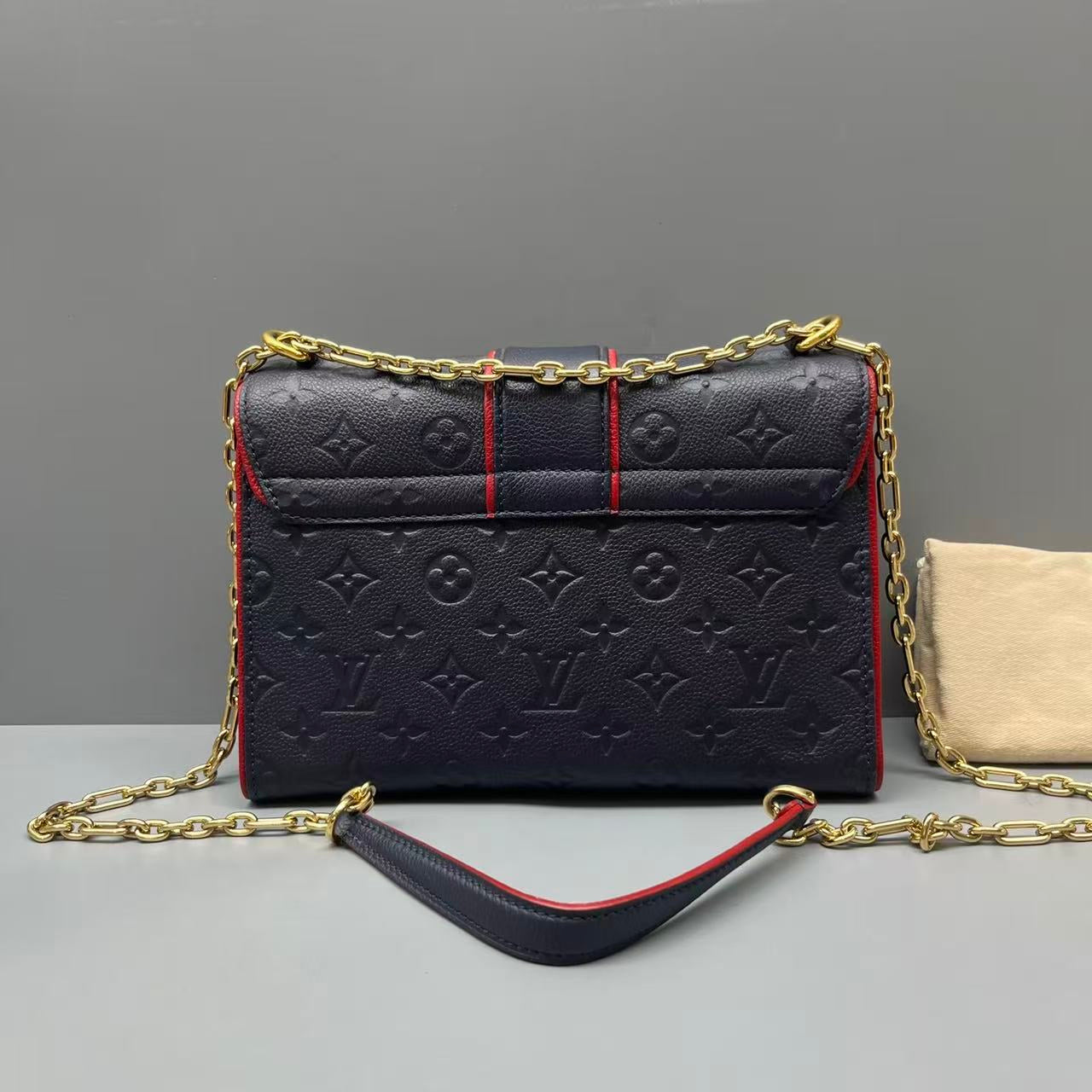 Louis Vuitton - Saint Sulpice PM - Monogram Empreinte leather - Navy with Red accents - (medium)