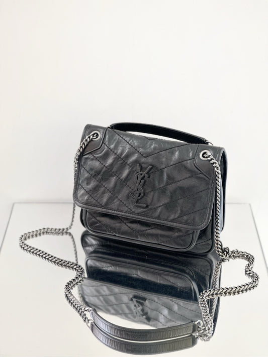 Saint Laurent - Niki Baby - Calfskin leather - Black - (mini)