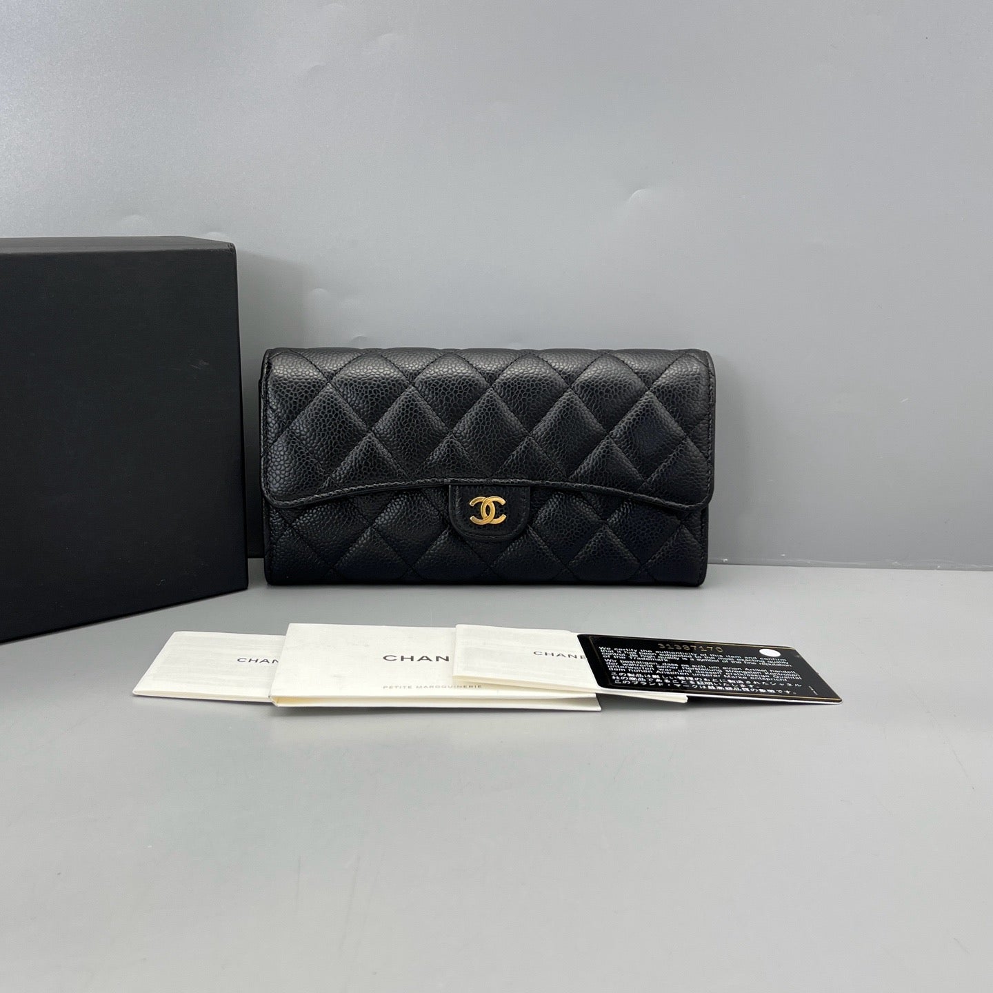 Chanel - Classic Flap Wallet - Caviar leather - Black with Gold-Tone Hardware - (Medium)