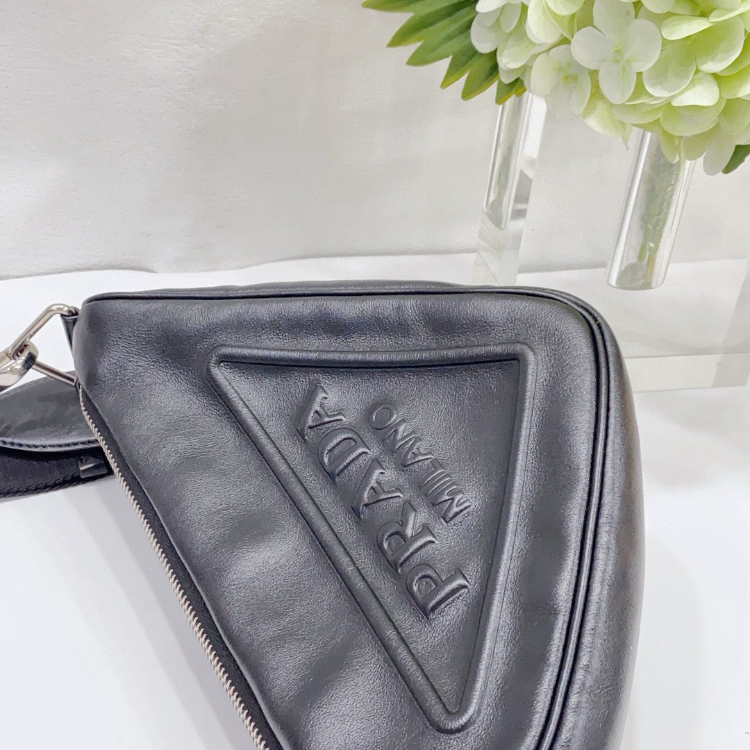 Prada - Embossed Logo Triangle Crossbody Bag - Smooth leather with fabric strap - Black - (medium)