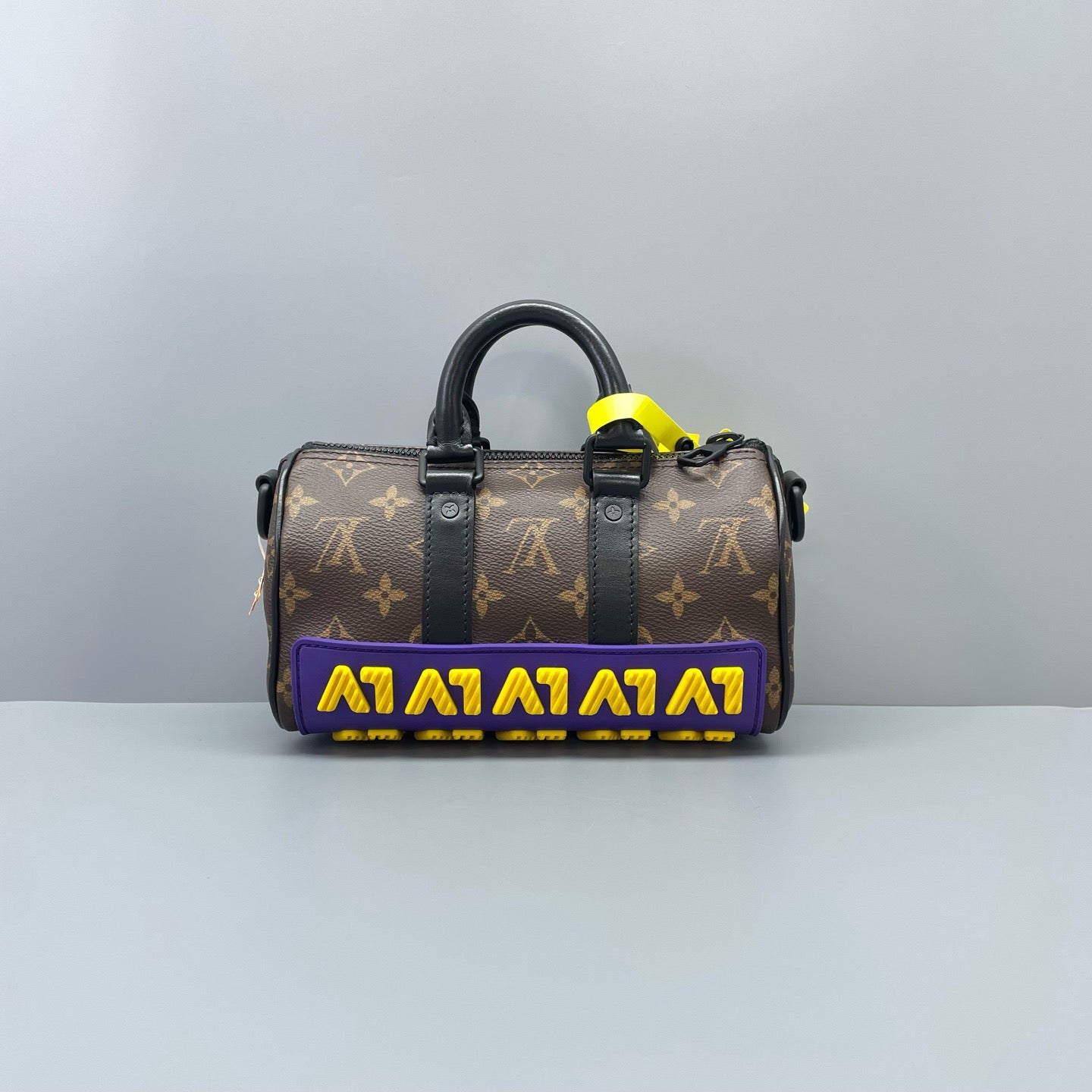 Louis Vuitton - Keepall Bandoulière XS Show Model - Monogram coated canvas with leather trims and rubber details - Brown, Black, Purple, Yellow - (mini)