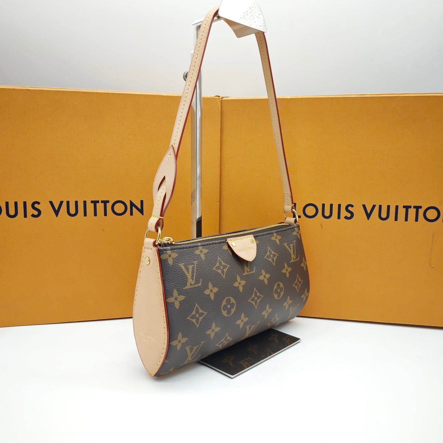 Louis Vuitton - Pochette Accessoires - Monogram coated canvas with Vachetta leather trim - Brown - (mini)