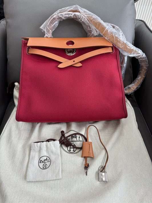 Hermès - Herbag 31 - Toile Officier canvas with Vachetta leather trim - Rouge H (Red) with Natural (Tan) leather and Palladium-plated hardware - (medium)