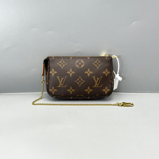 Louis Vuitton - Mini Pochette Accessoires - Monogram coated canvas - Brown - (Mini)