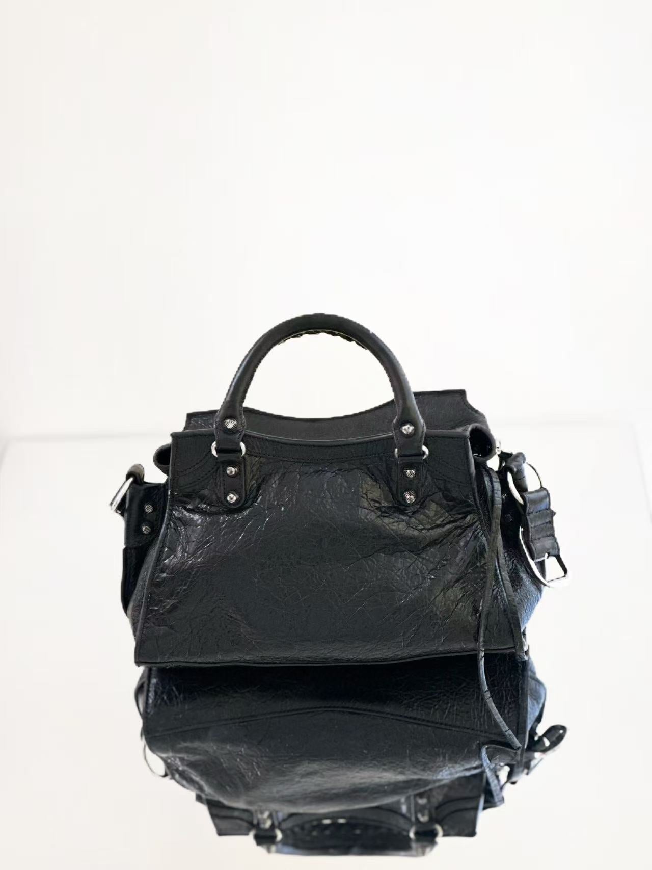 Balenciaga - Neo Cagole City - Distressed lambskin leather - Black - (small)