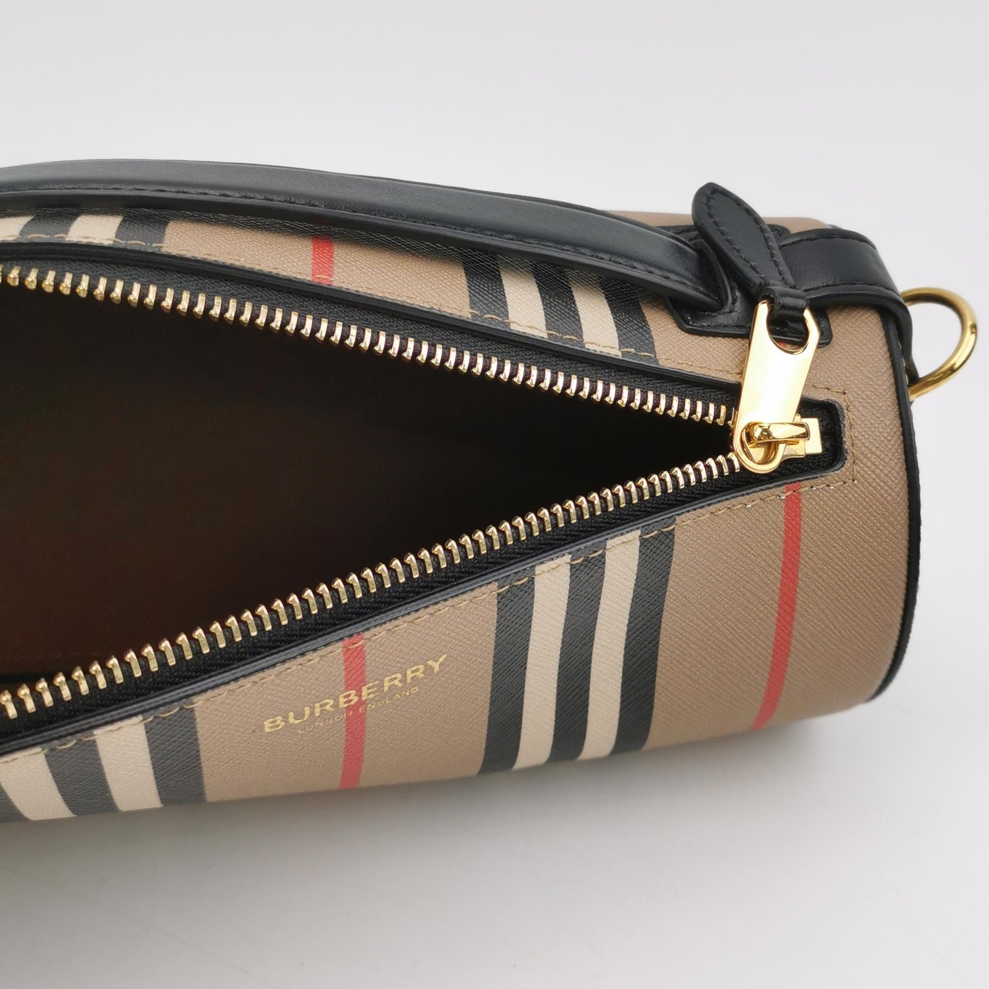 Burberry - E-canvas Stripe Cylindrical Bag (Product Code: 80304561) - E-canvas (Coated Canvas) with Leather trim - Beige with Black, White, and Red stripes; Black leather trim; Gold-tone hardware - (mini)