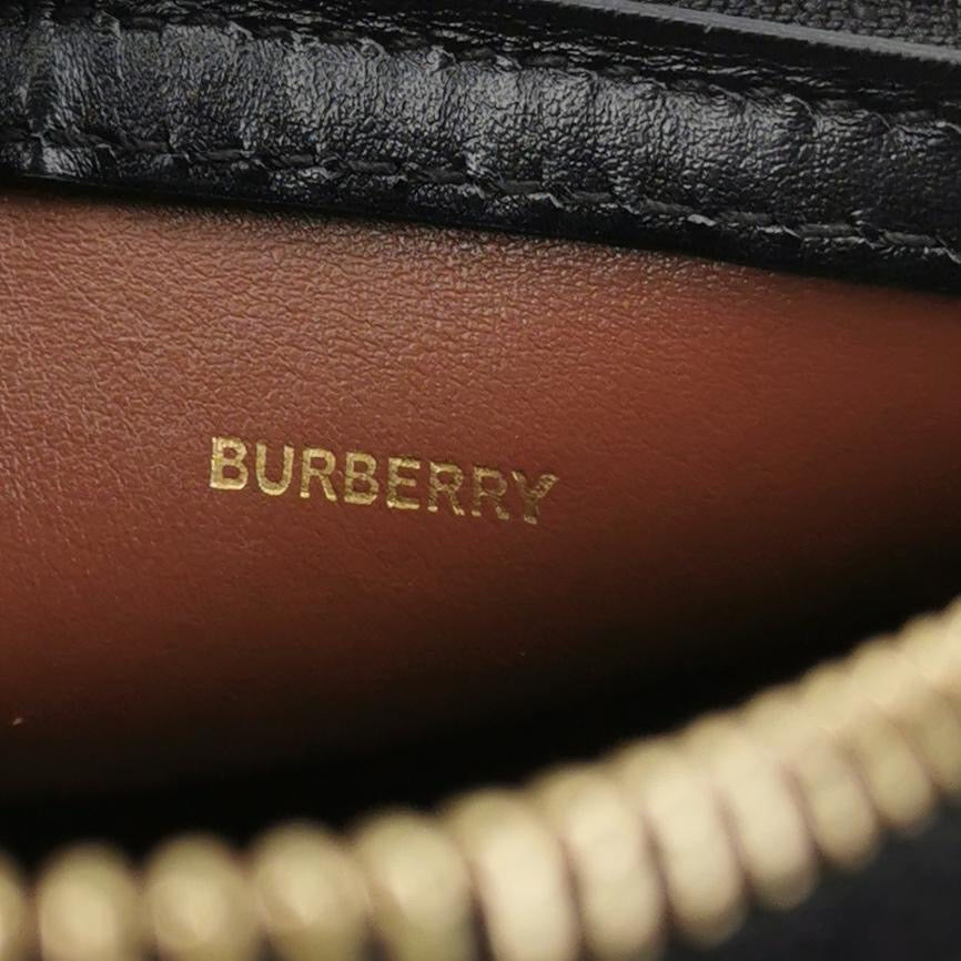 Burberry - E-canvas Stripe Cylindrical Bag (Product Code: 80304561) - E-canvas (Coated Canvas) with Leather trim - Beige with Black, White, and Red stripes; Black leather trim; Gold-tone hardware - (mini)