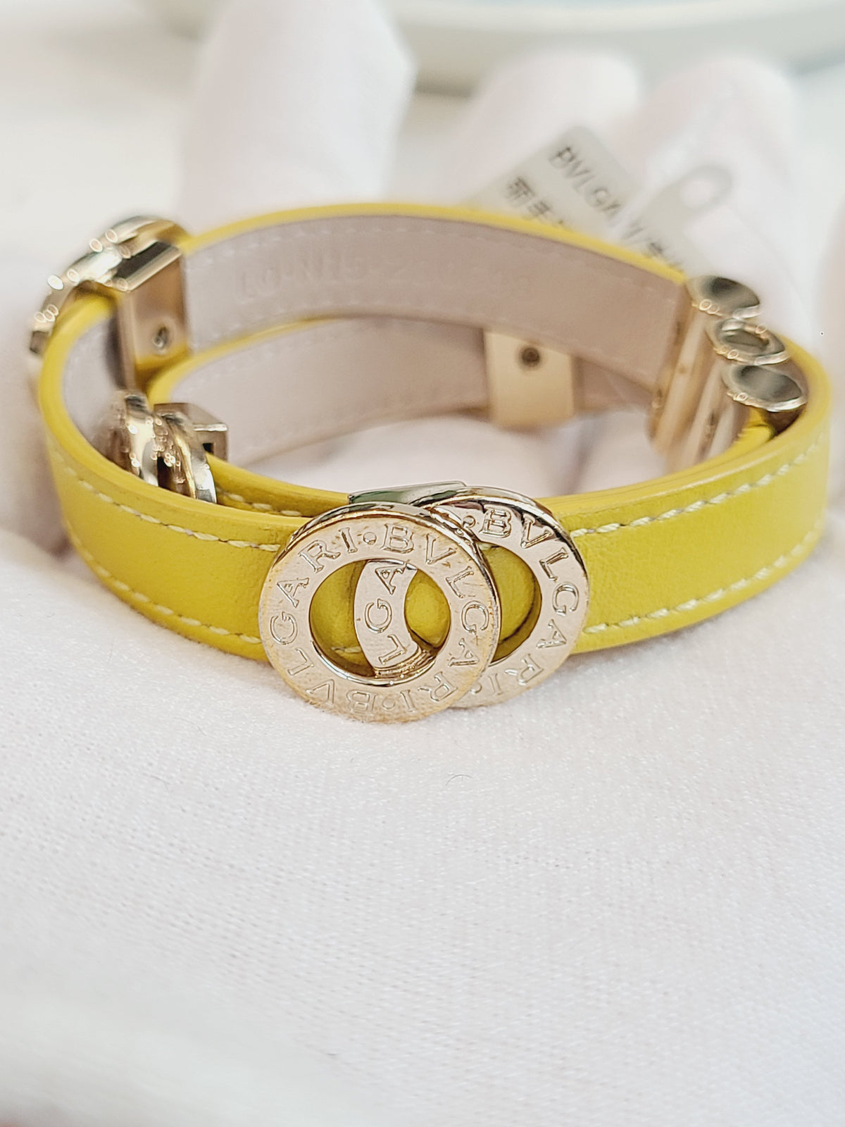 Bvlgari - Bvlgari Bvlgari - Gold-tone metal logo and clasp hardware with a calfskin leather strap. - Yellow