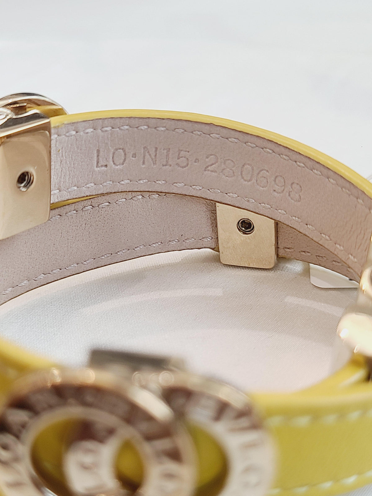 Bvlgari - Bvlgari Bvlgari - Gold-tone metal logo and clasp hardware with a calfskin leather strap. - Yellow
