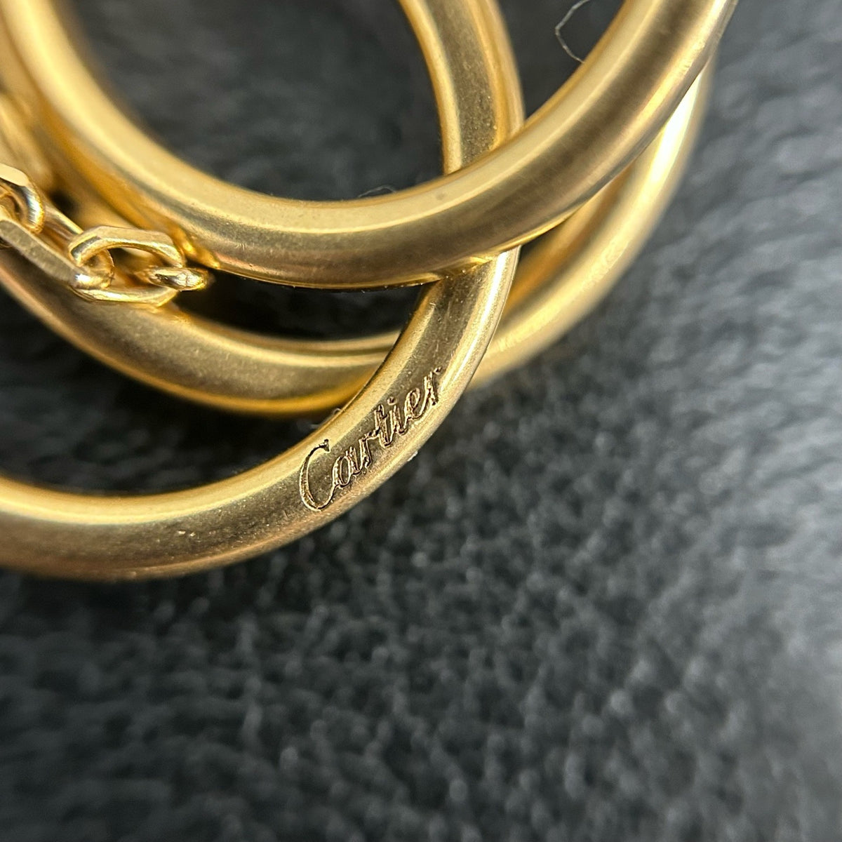 Cartier - Trinity - 18K rose, yellow, and white gold, with pink diamonds set around one ring. - Gold