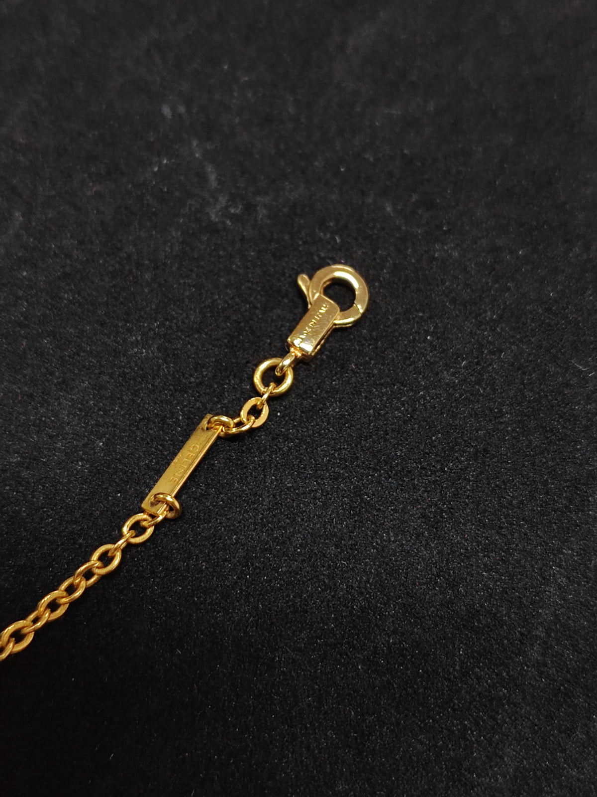 Celine - Other - Gold-tone metal chain and letter charms with clear rhinestone embellishments. - Gold