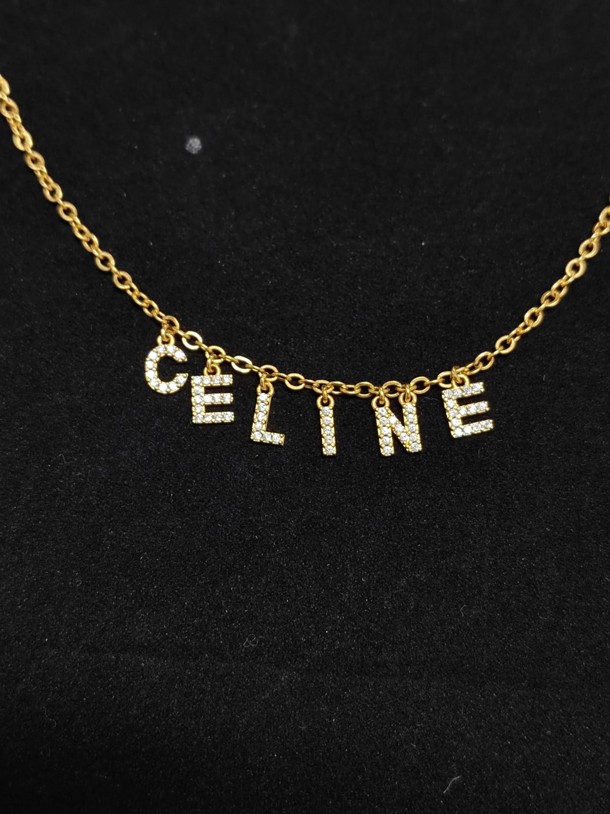 Celine - Other - Gold-tone metal chain and letter charms with clear rhinestone embellishments. - Gold