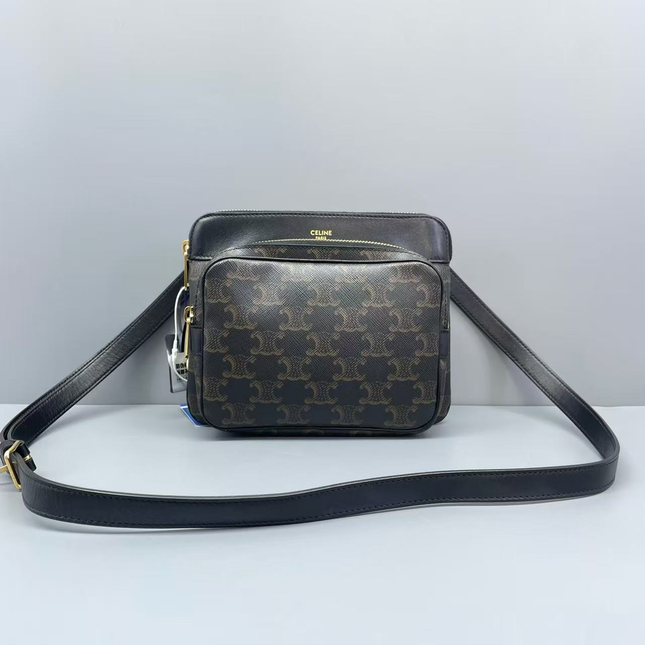 Celine - Triomphe Canvas Camera Bag - Triomphe canvas with calfskin leather trim - Brown Triomphe canvas with black leather trim and gold-tone hardware - (small)