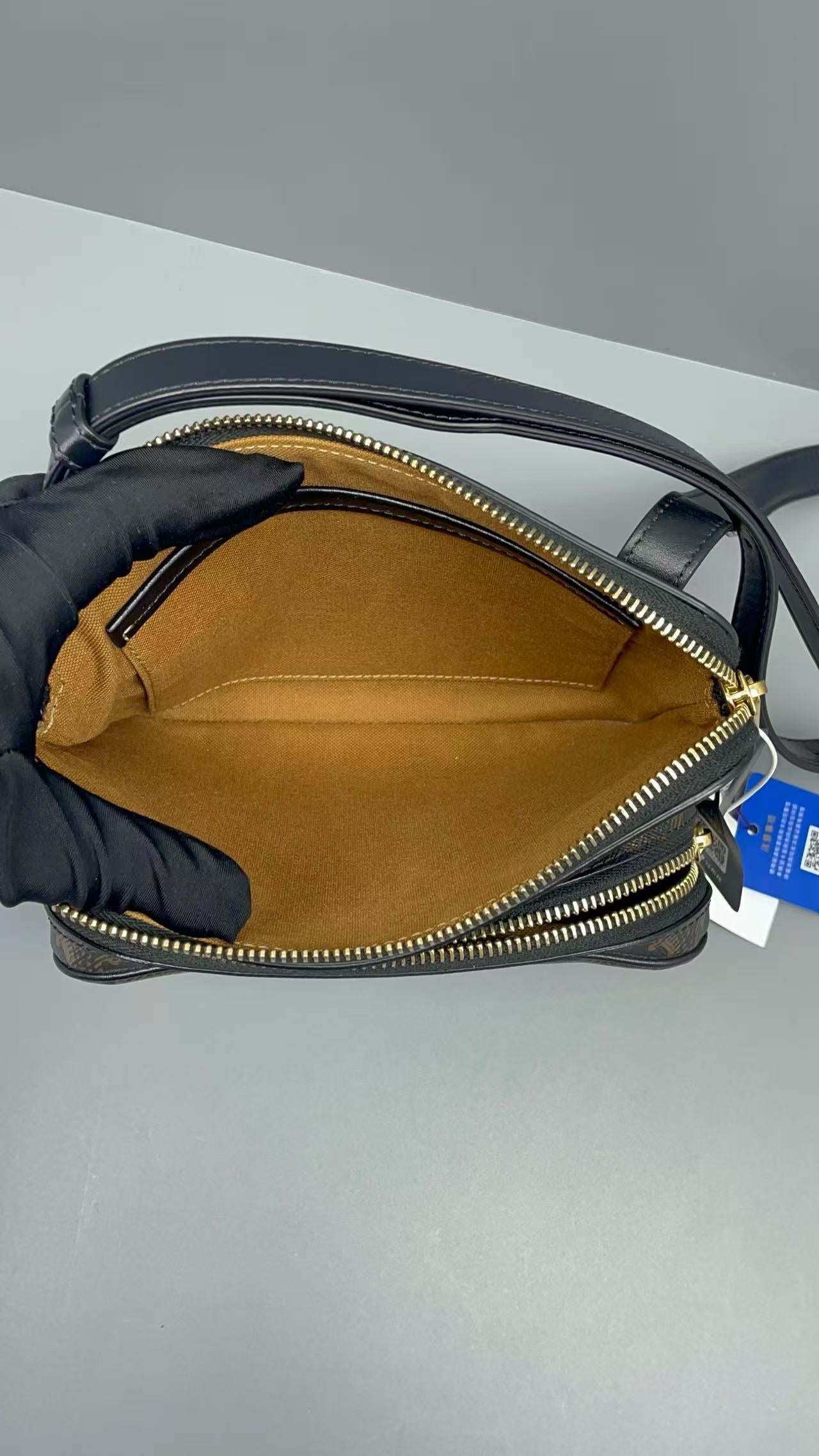 Celine - Triomphe Canvas Camera Bag - Triomphe canvas with calfskin leather trim - Brown Triomphe canvas with black leather trim and gold-tone hardware - (small)