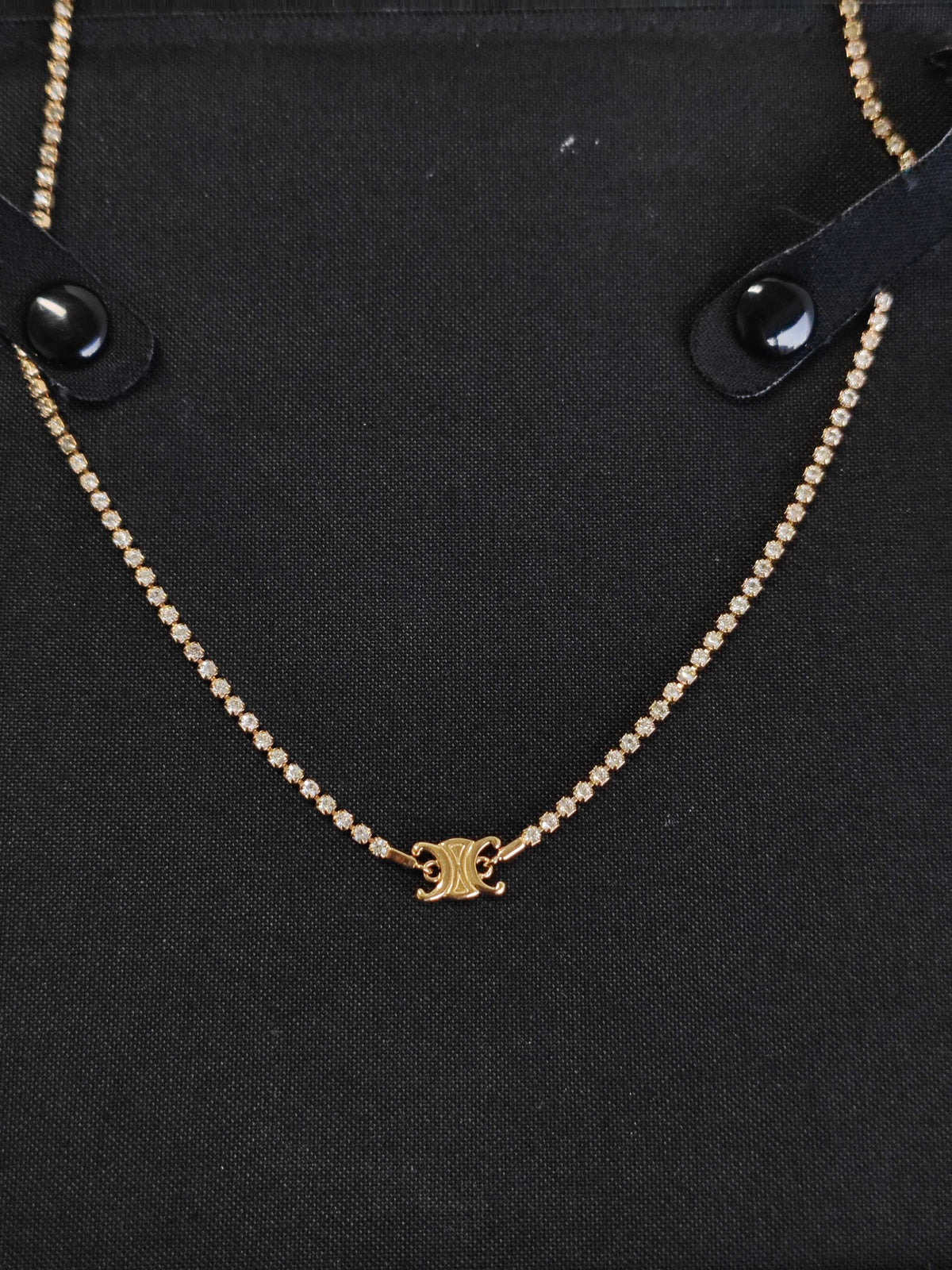 Celine - Triomphe - Gold-tone metal with clear rhinestone embellishments; specific base-metal composition is not established. - Gold