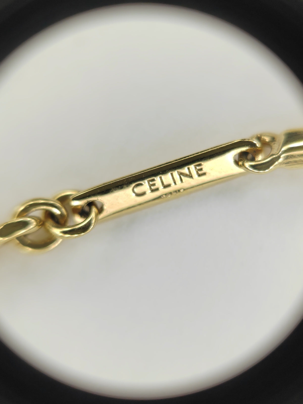 Celine - Triomphe - Gold-tone metal with clear rhinestone embellishments; specific base-metal composition is not established. - Gold