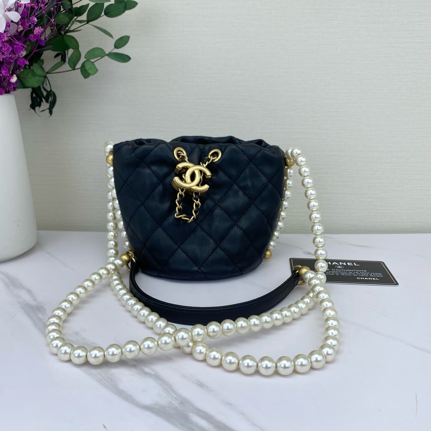 Chanel - Bucket Bag with Pearl Chain - Caviar leather - Black - (mini)