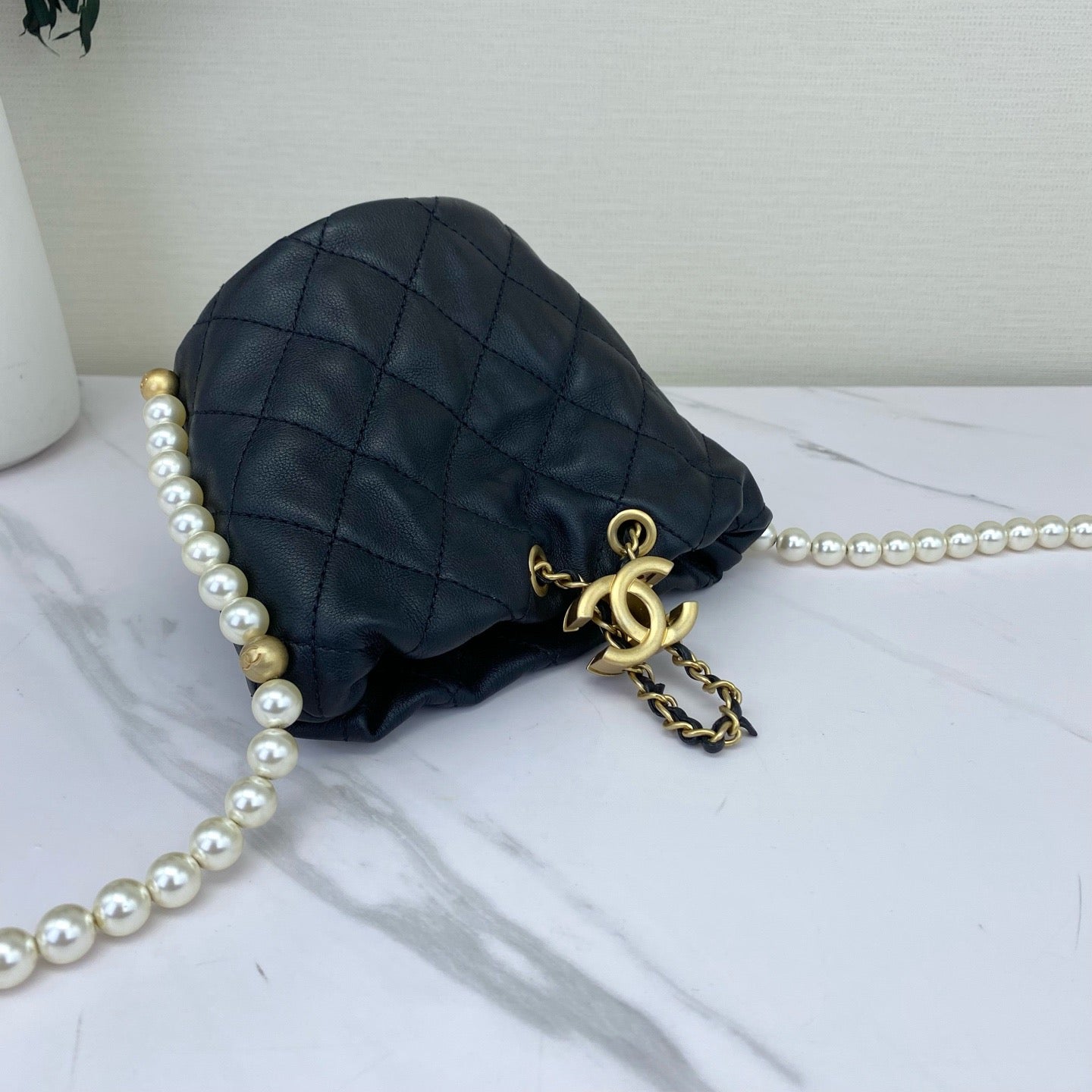 Chanel - Bucket Bag with Pearl Chain - Caviar leather - Black - (mini)