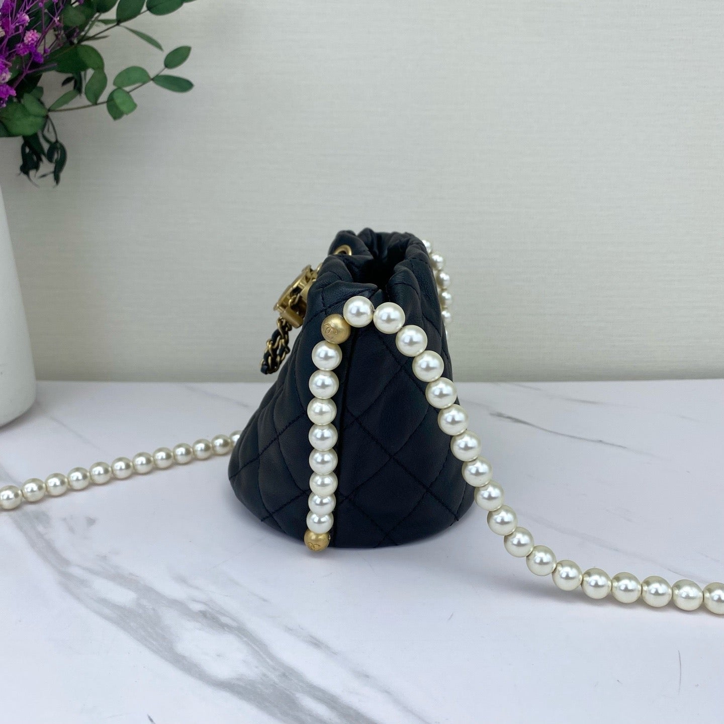 Chanel - Bucket Bag with Pearl Chain - Caviar leather - Black - (mini)