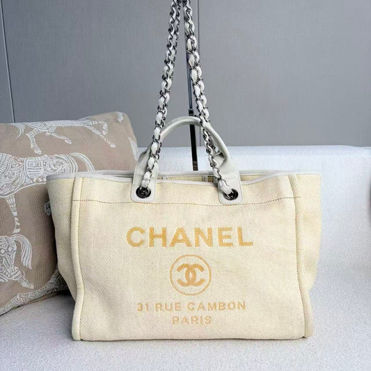Chanel - Deauville Tote - Raffia woven with leather trim - Light Yellow with Silver-Tone Hardware - (Medium)
