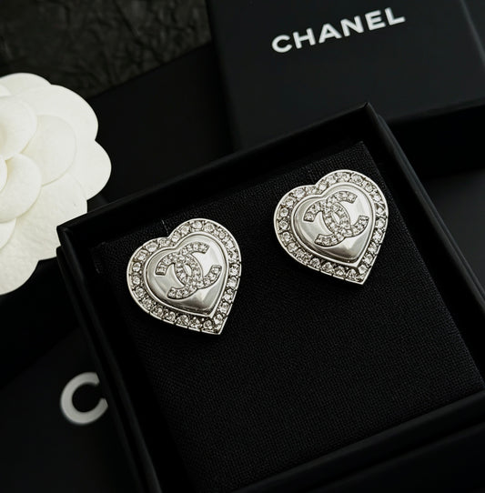 Chanel - Double C Heart 23B - Silver-tone metal with clear crystal embellishments and a pearlescent heart-shaped center. - Silver
