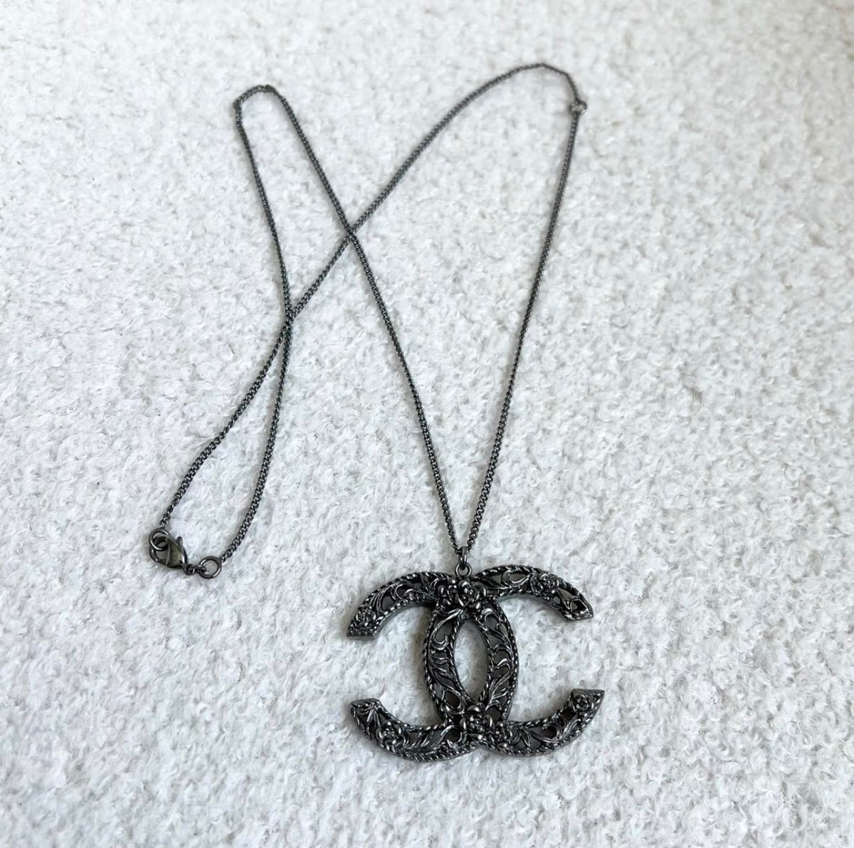 Chanel - Other - Base metal with a blackened silver-tone finish; exact alloy unknown. - Black