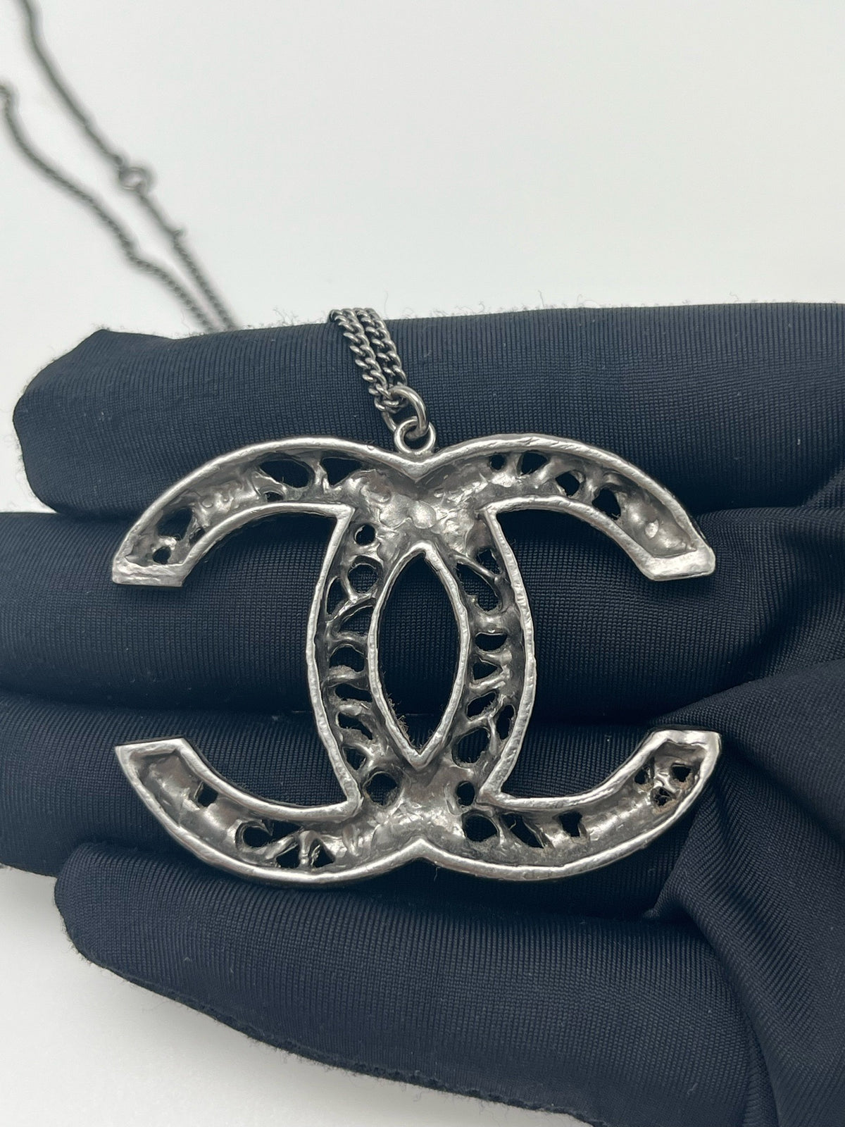 Chanel - Other - Base metal with a blackened silver-tone finish; exact alloy unknown. - Black