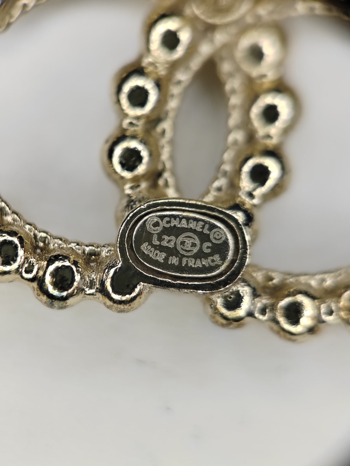 Chanel - Other - Base metal with a gold-tone finish. - Gold