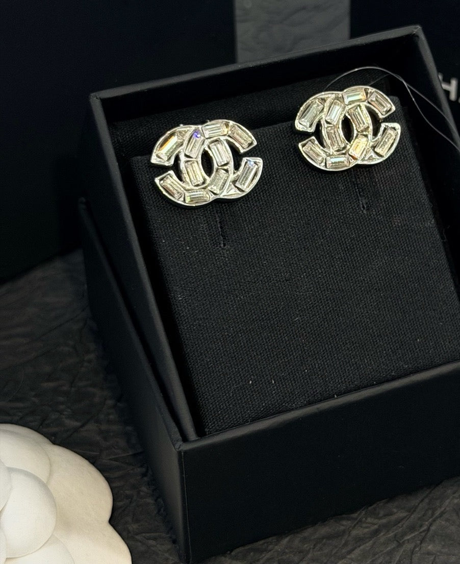 Chanel - Other - Base metal with clear faceted crystal embellishments and a silver-tone finish. - Silver