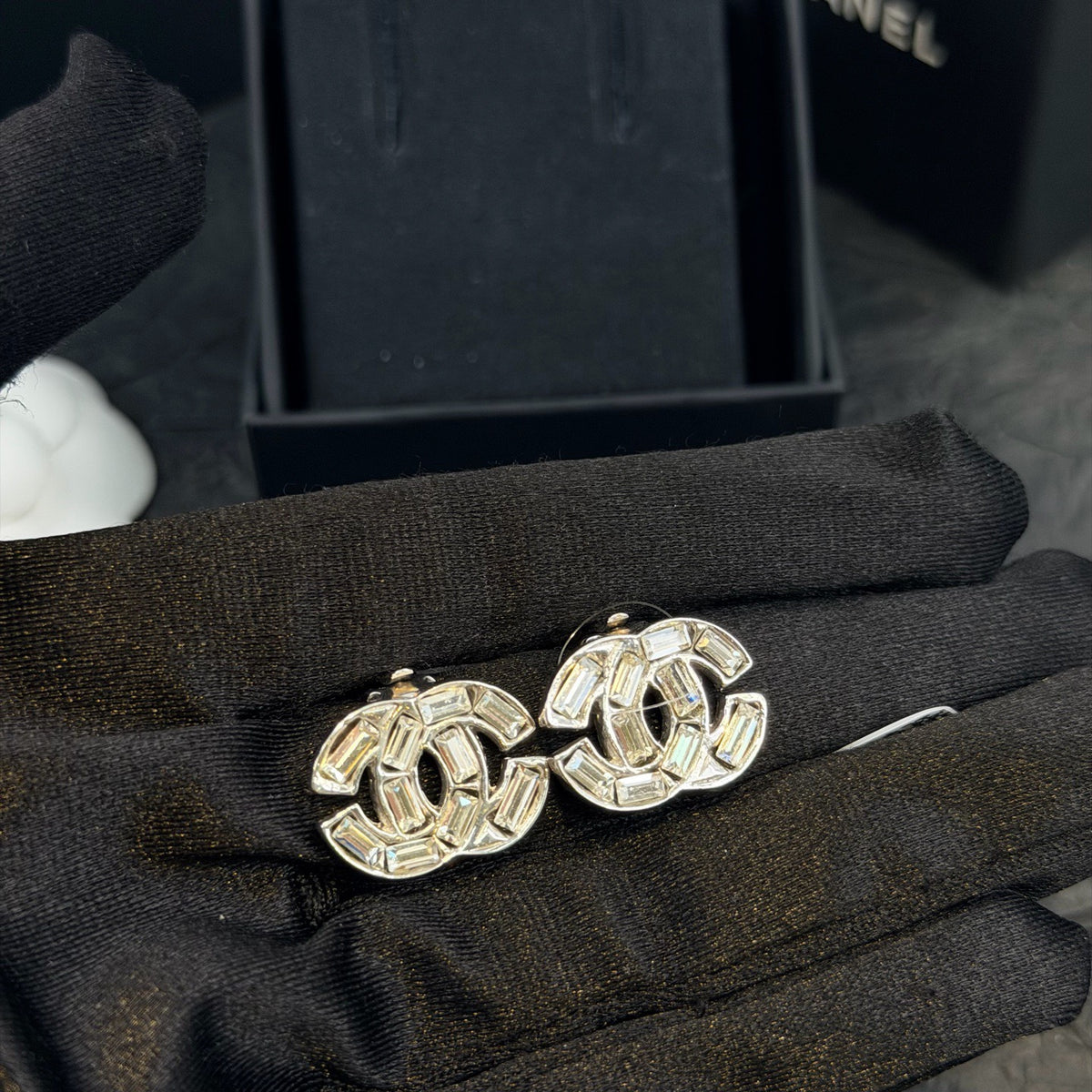 Chanel - Other - Base metal with clear faceted crystal embellishments and a silver-tone finish. - Silver