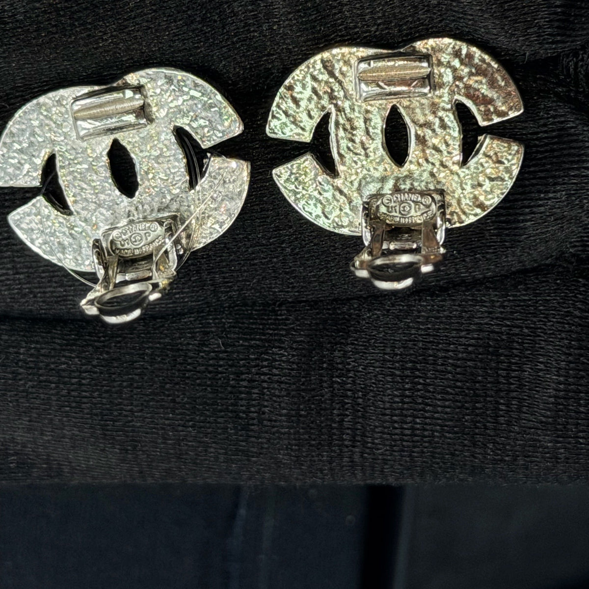 Chanel - Other - Base metal with clear faceted crystal embellishments and a silver-tone finish. - Silver