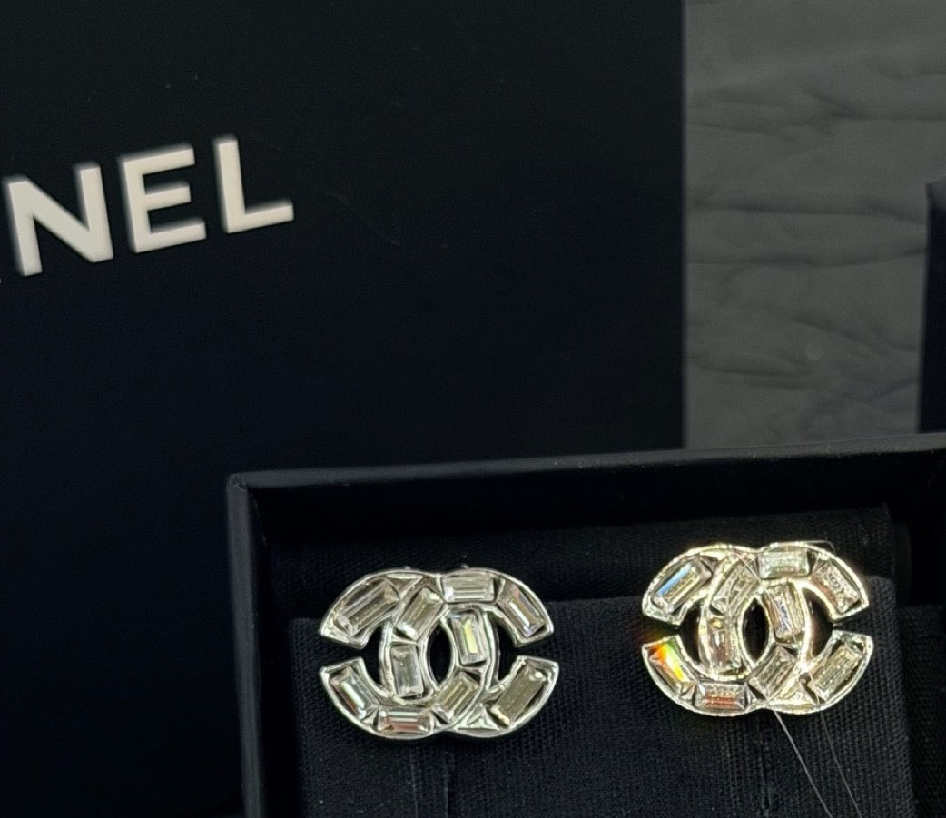 Chanel - Other - Base metal with clear faceted crystal embellishments and a silver-tone finish. - Silver