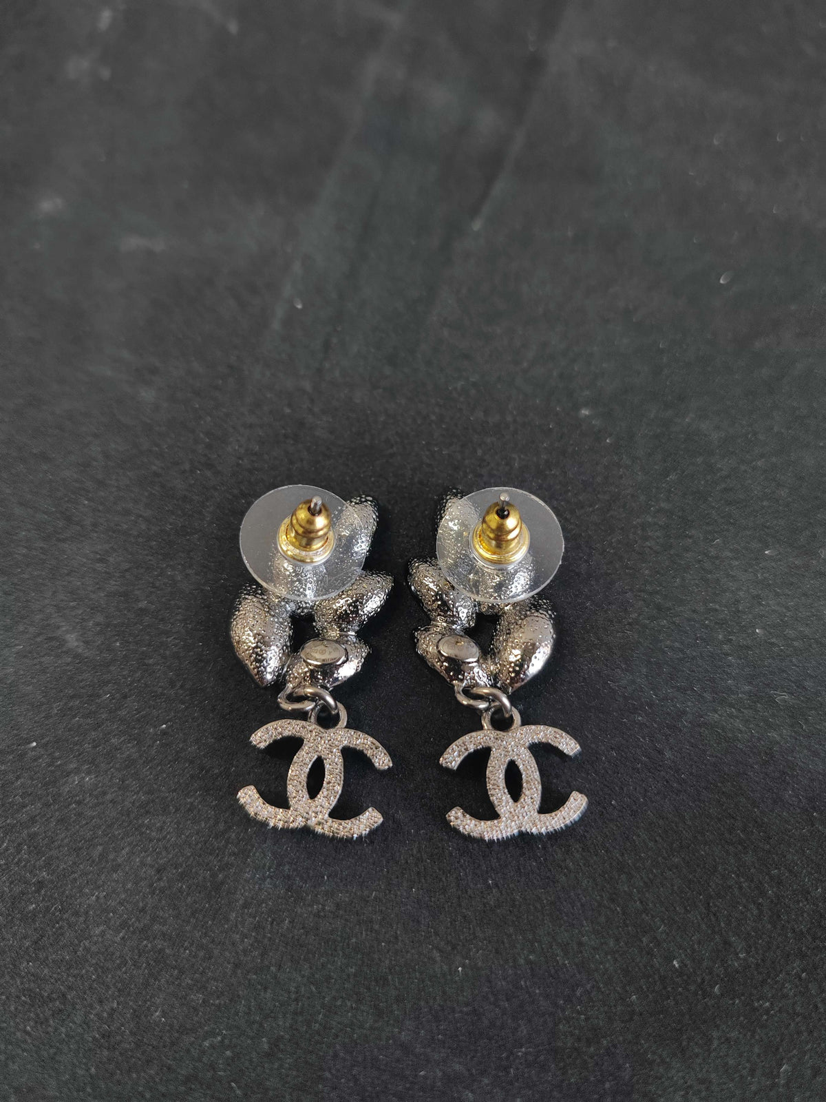 Chanel - Other - Base metal with crystal embellishments. - Silver