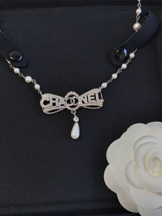 Chanel - Other - Base metal with glass rhinestones and imitation pearls - Silver