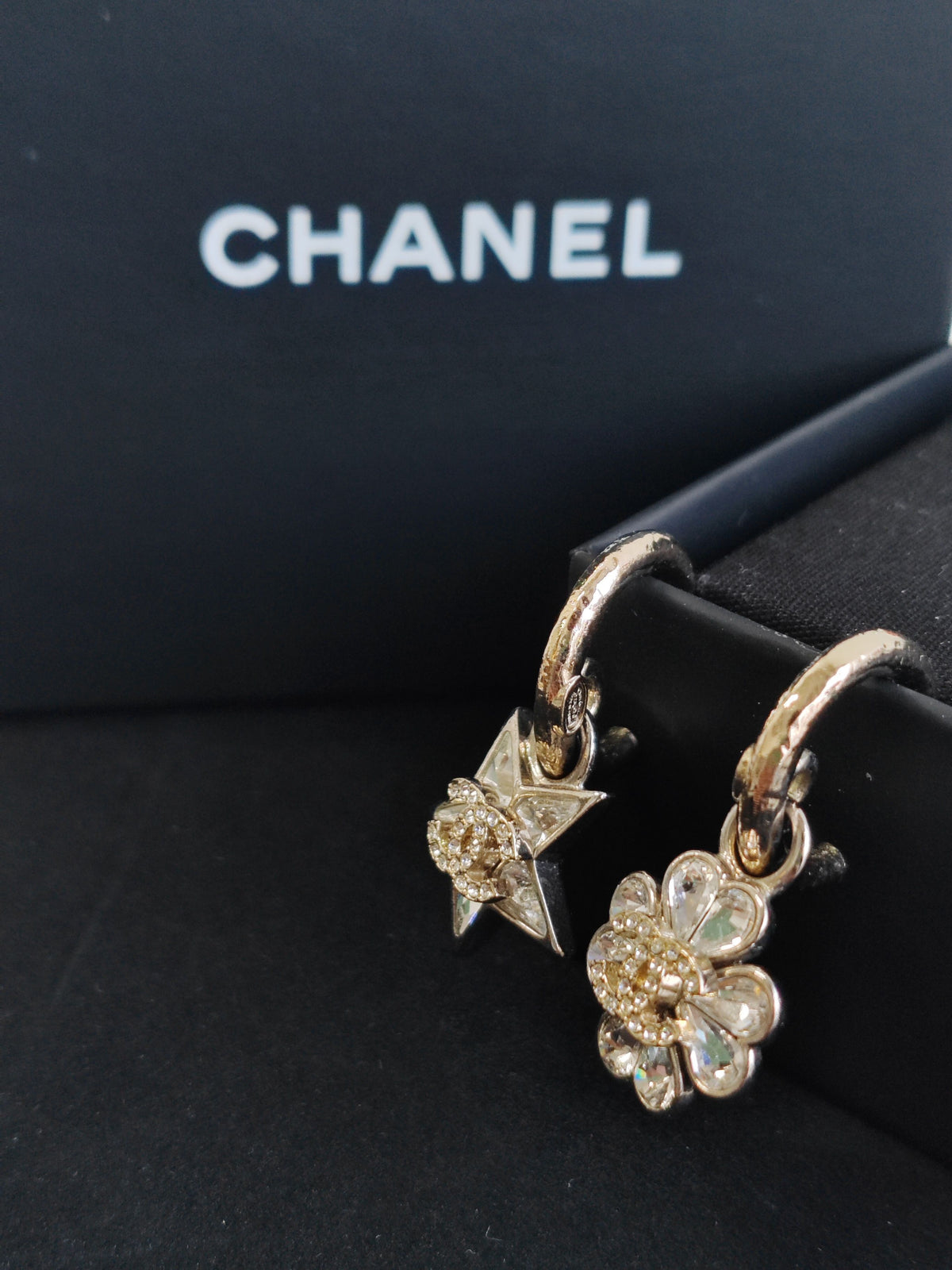 Chanel - Other - Base metal with gold-tone and silver-tone finishes and clear rhinestone embellishments. - Multicolour
