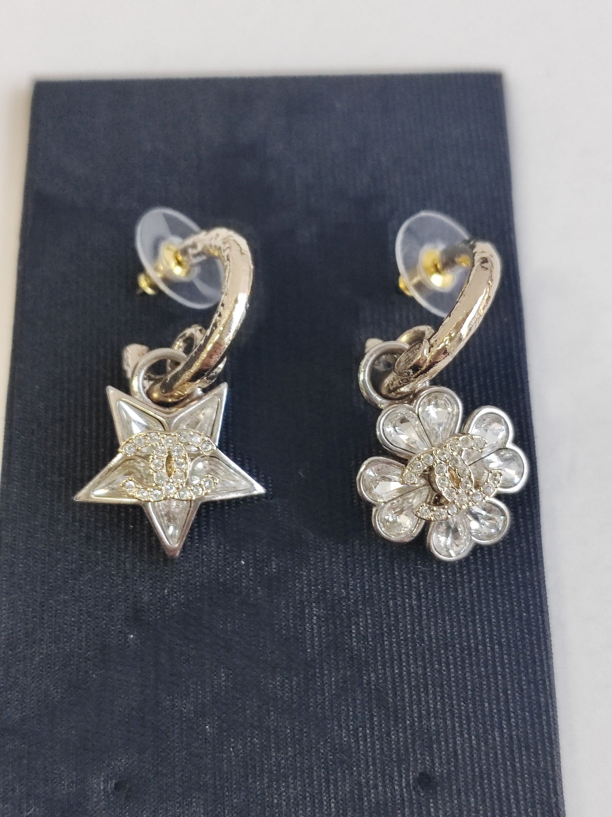 Chanel - Other - Base metal with gold-tone and silver-tone finishes and clear rhinestone embellishments. - Multicolour