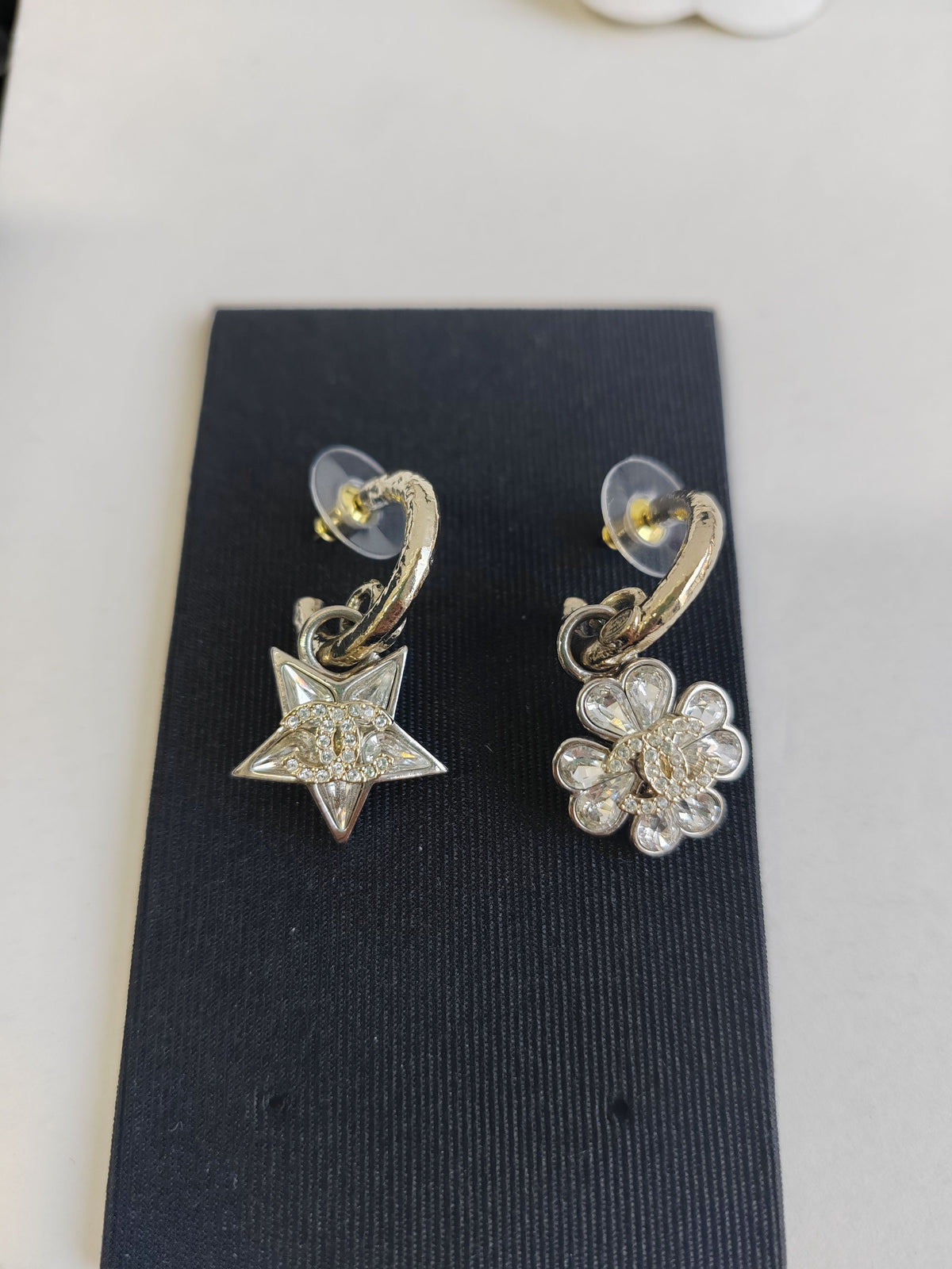 Chanel - Other - Base metal with gold-tone and silver-tone finishes and clear rhinestone embellishments. - Multicolour