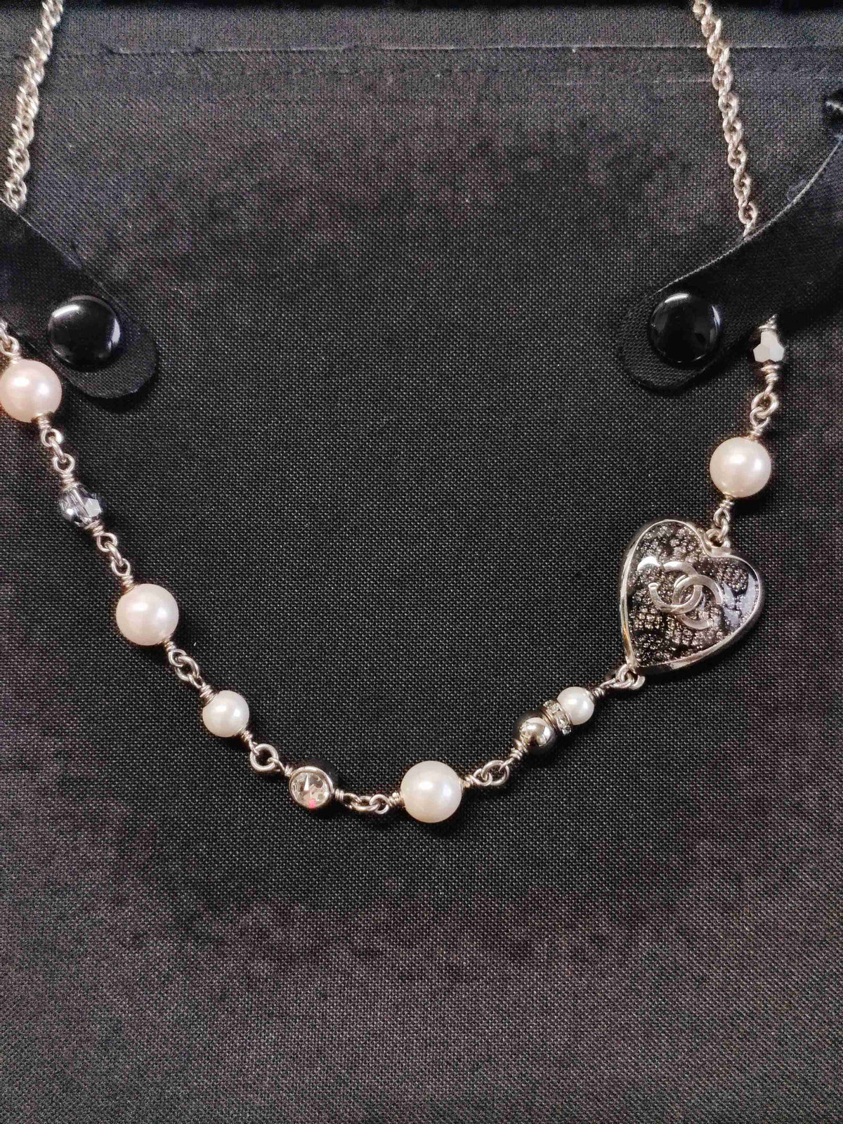 Chanel - Other - Base metal with imitation pearls and crystal embellishments; silver-tone finish. - Black