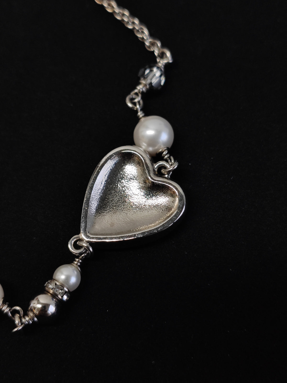 Chanel - Other - Base metal with imitation pearls and crystal embellishments; silver-tone finish. - Black
