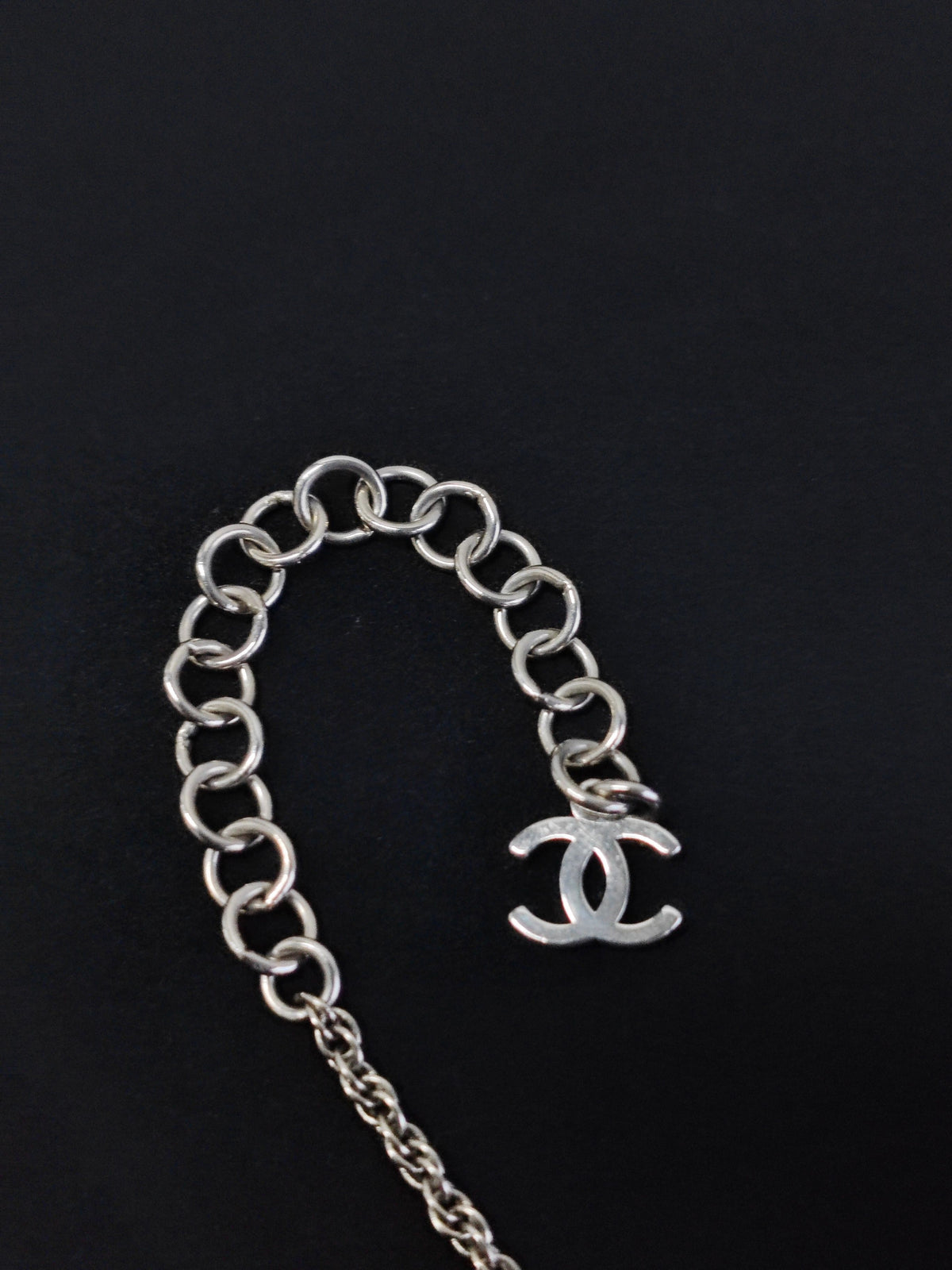 Chanel - Other - Base metal with imitation pearls and crystal embellishments; silver-tone finish. - Black