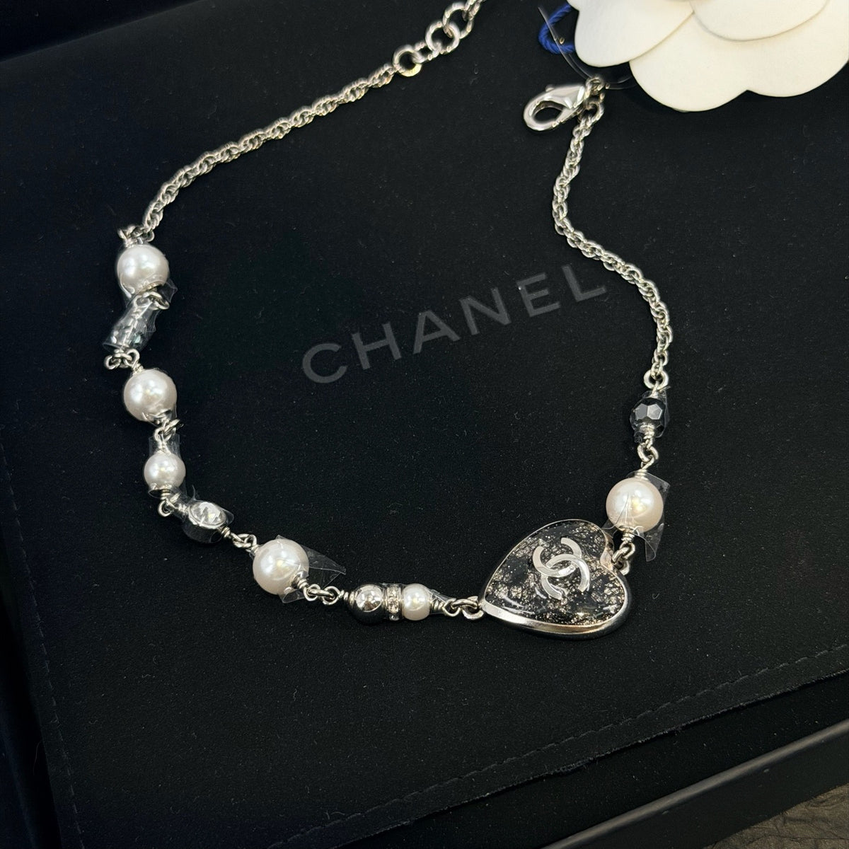 Chanel - Other - Chanel costume jewellery commonly uses base-metal alloy with glass elements and imitation pearls; exact composition is not confirmed. - Multicolour